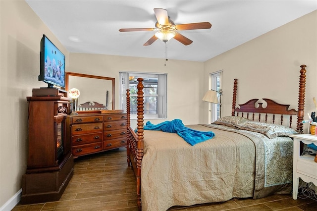 bedroom featuring wood finish floors and a ceiling fan