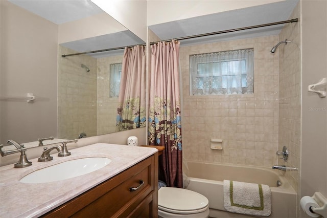 full bathroom with toilet, shower / bathtub combination with curtain, and vanity