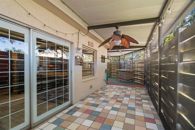 view of patio / terrace featuring ceiling fan