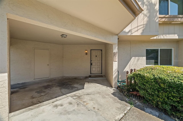 property entrance with a patio area