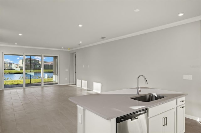 kitchen with stainless steel dishwasher, sink, a water view, a center island with sink, and white cabinets