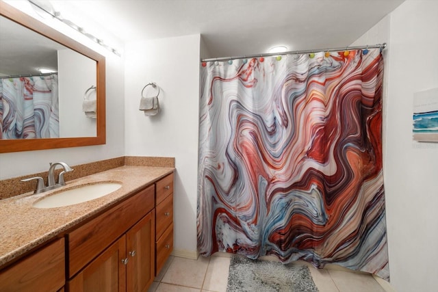 bathroom featuring vanity and tile patterned flooring