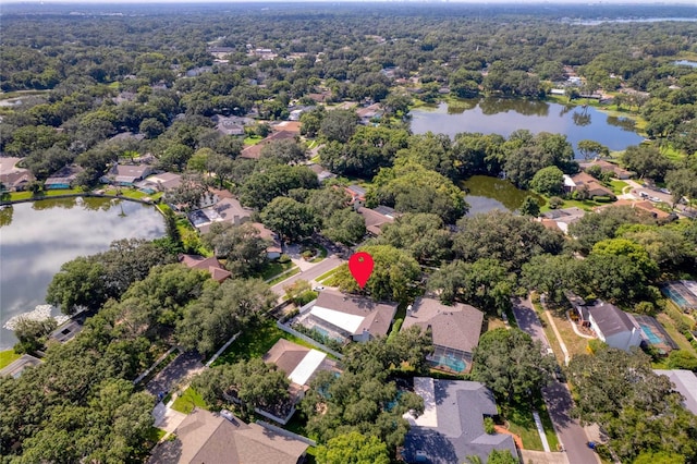 birds eye view of property featuring a water view