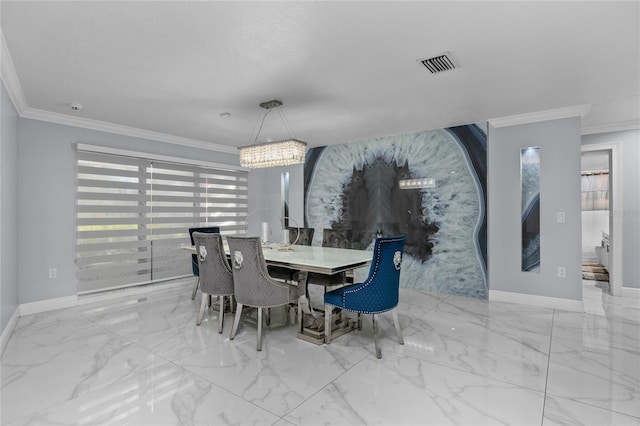 dining area featuring ornamental molding