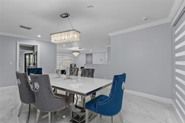 dining room featuring a chandelier and crown molding