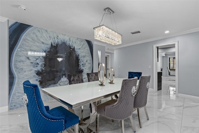 dining room featuring crown molding and a chandelier