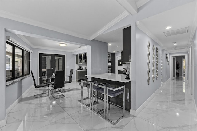 interior space with ornamental molding and french doors