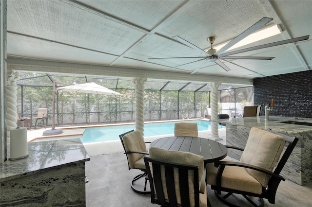 exterior space featuring a pool and ceiling fan