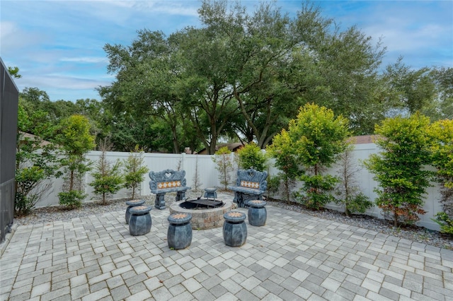 view of patio / terrace featuring a fire pit