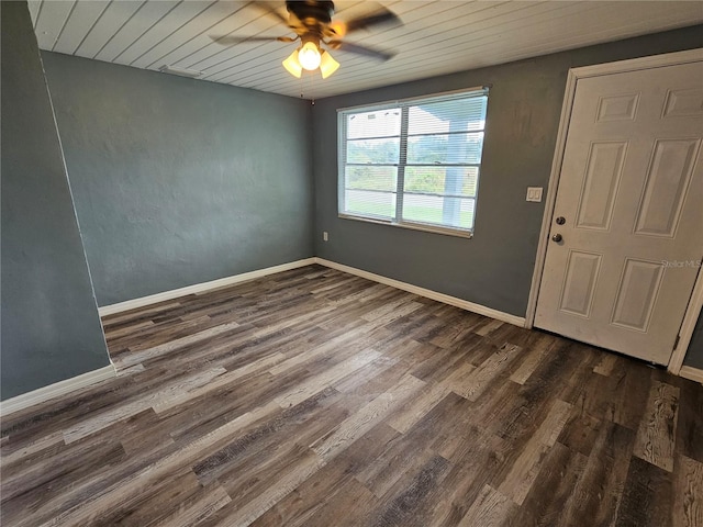 foyer featuring wood ceiling, dark hardwood / wood-style floors, and ceiling fan