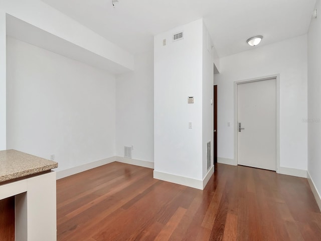 interior space featuring dark hardwood / wood-style flooring