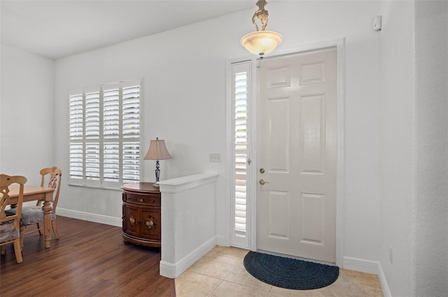 entrance foyer with hardwood / wood-style floors