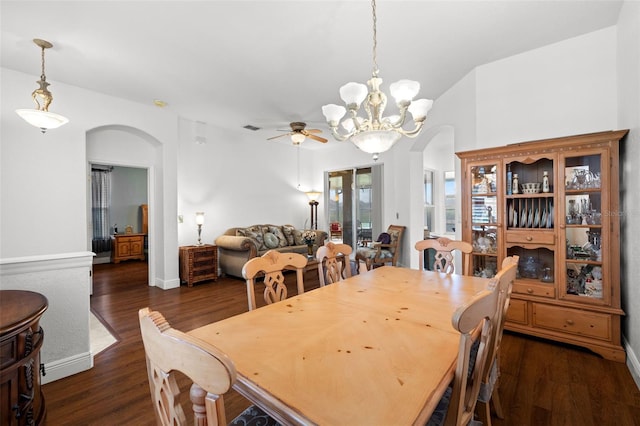 dining space featuring ceiling fan and dark hardwood / wood-style flooring