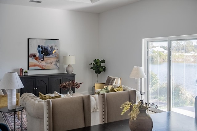 living area featuring plenty of natural light