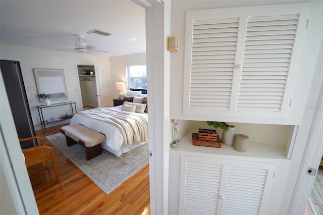 bedroom featuring ceiling fan and wood-type flooring