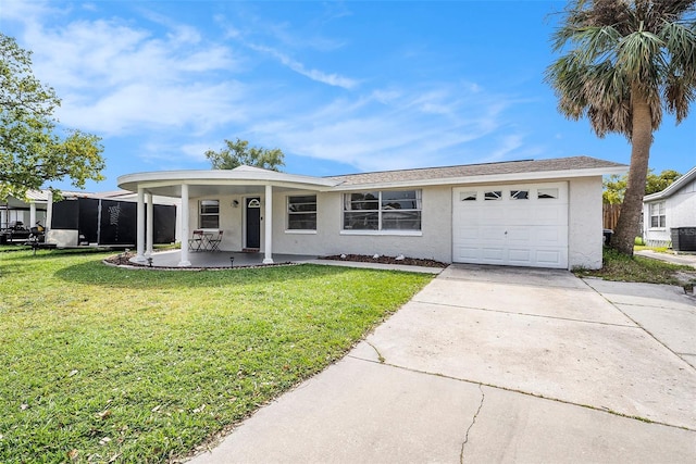 ranch-style house with a front yard, central AC unit, and a garage