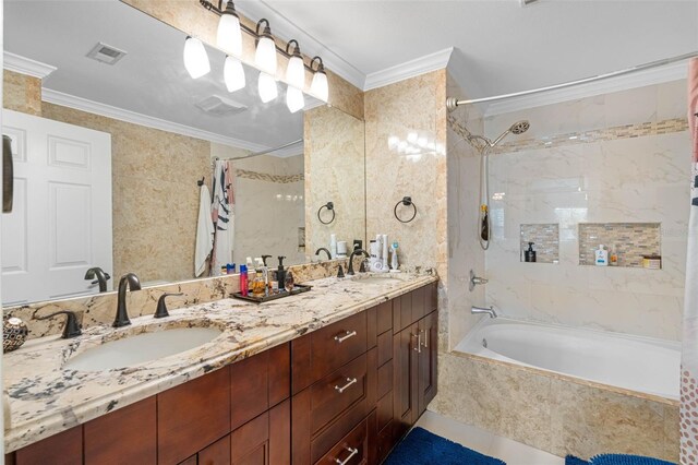 bathroom with shower / bath combo with shower curtain, crown molding, vanity, and tile patterned floors