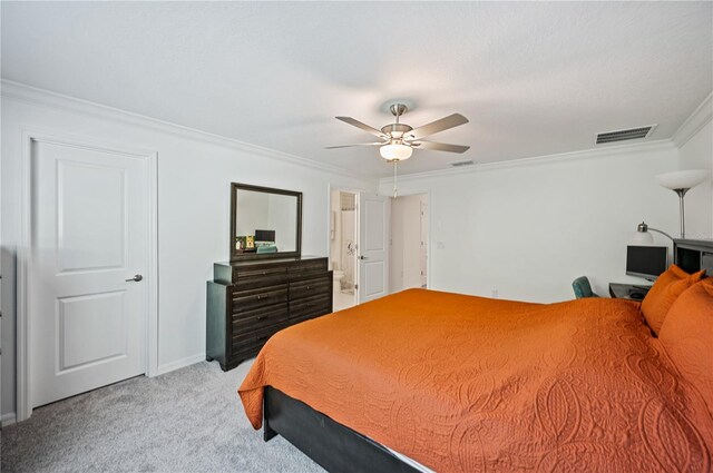 bedroom with ceiling fan, light carpet, and crown molding