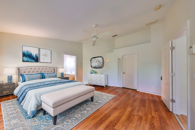 bedroom featuring ceiling fan and wood-type flooring