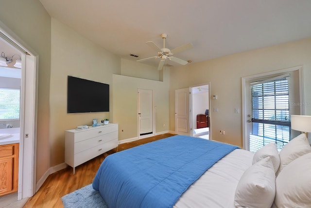 bedroom with ceiling fan and light hardwood / wood-style flooring