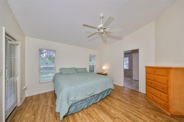 bedroom with lofted ceiling, wood-type flooring, and ceiling fan