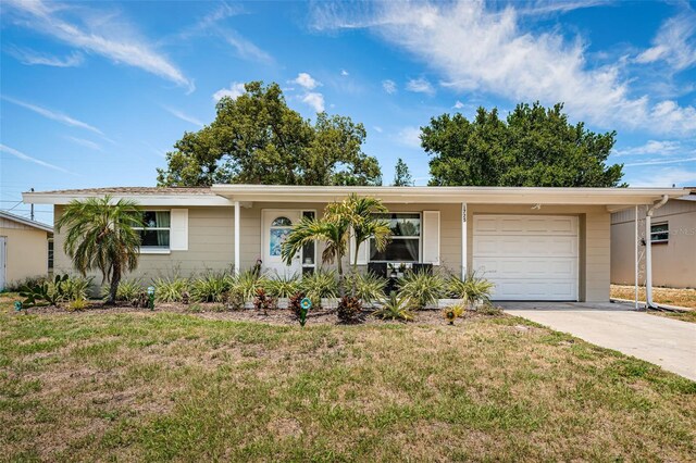 ranch-style home featuring a front yard and a garage