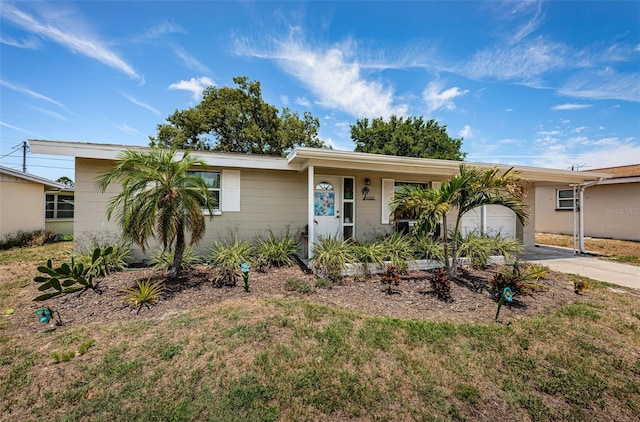 ranch-style house featuring a garage