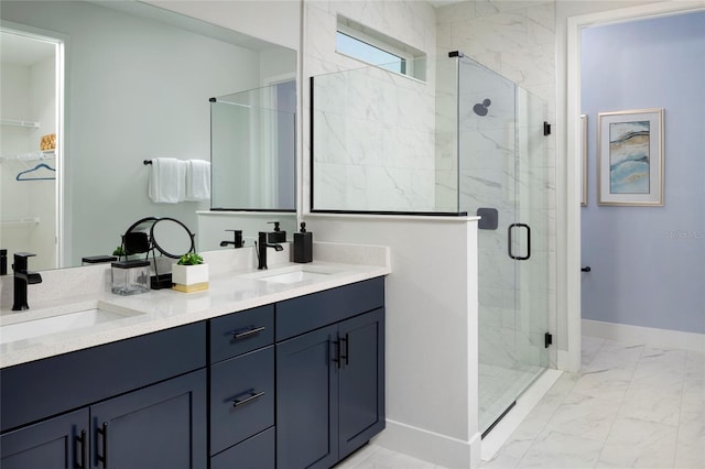 bathroom featuring vanity and a shower with shower door