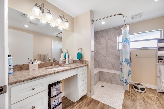 bathroom featuring vanity and a shower with curtain