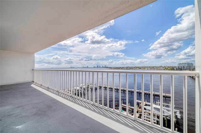 balcony featuring a water view