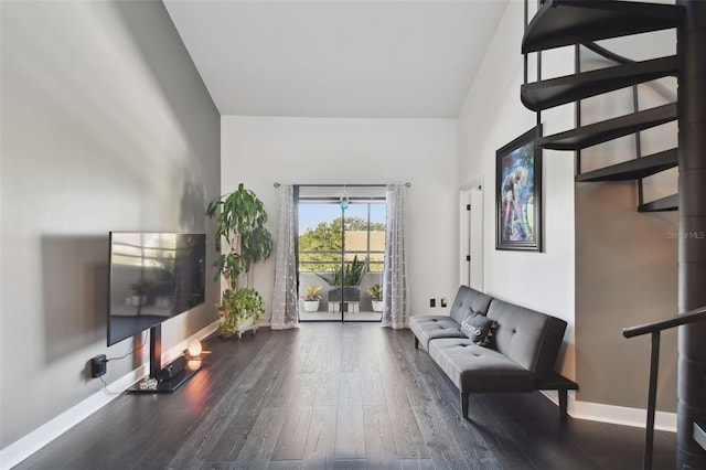 sitting room featuring dark wood-type flooring