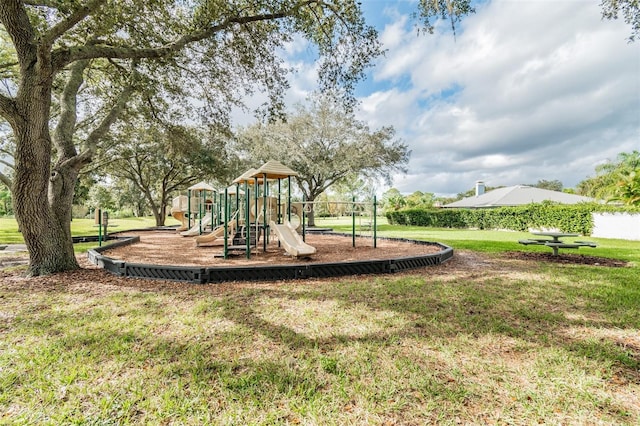 view of jungle gym with a lawn