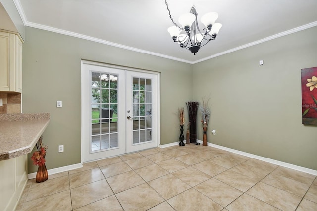 interior space featuring an inviting chandelier, french doors, light tile patterned floors, and ornamental molding