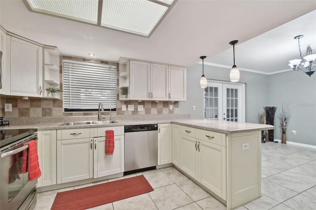 kitchen with tasteful backsplash, appliances with stainless steel finishes, hanging light fixtures, sink, and kitchen peninsula