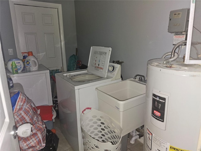 laundry area featuring sink, independent washer and dryer, electric water heater, and light tile patterned floors