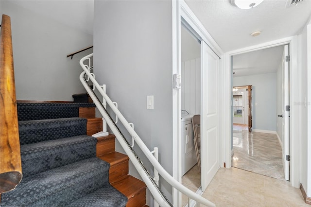 stairway with tile patterned flooring