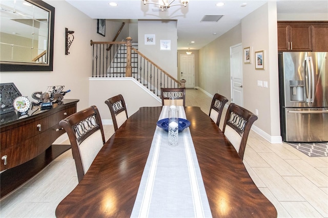 dining room featuring a chandelier