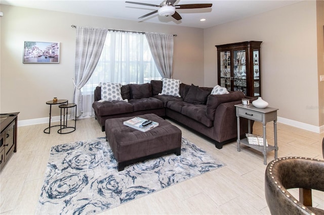 living room featuring ceiling fan