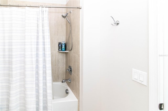 bathroom with shower / bath combo