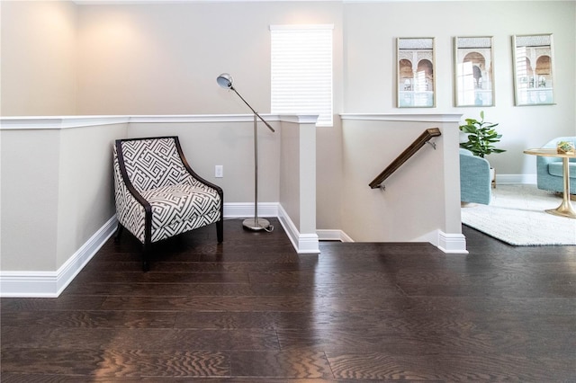 sitting room with hardwood / wood-style floors