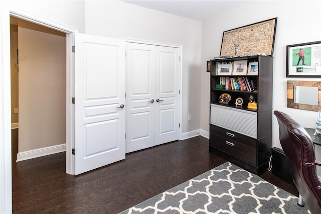 office space with dark hardwood / wood-style flooring