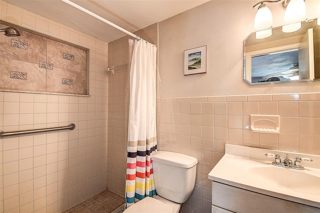 bathroom with walk in shower, tile walls, vanity, and toilet