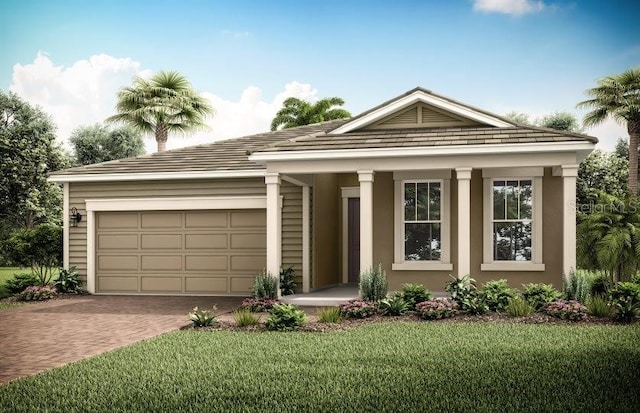 view of front of home featuring a garage and a front yard