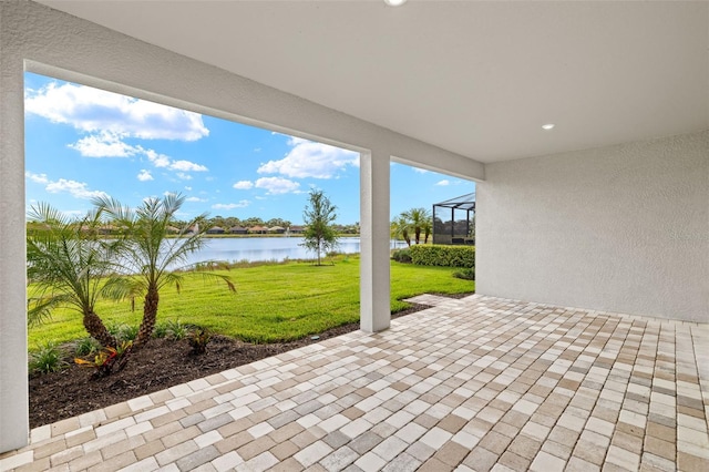 view of patio with a water view