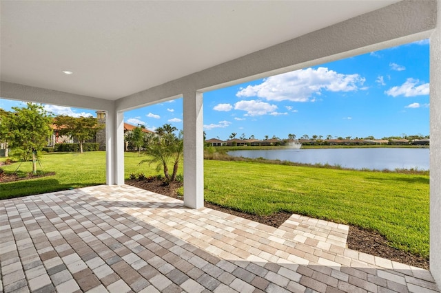 view of patio / terrace with a water view