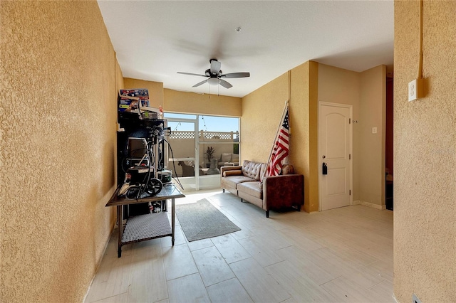 interior space featuring ceiling fan and light hardwood / wood-style flooring