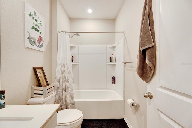 full bathroom with vanity, shower / bath combo with shower curtain, and toilet