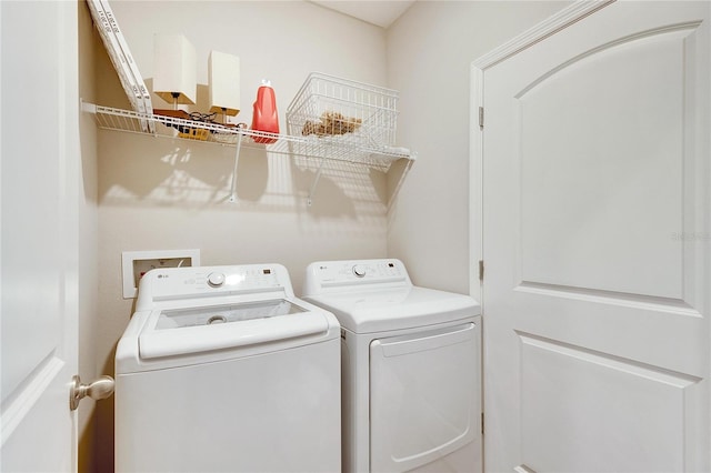 laundry room featuring independent washer and dryer