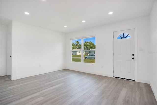 entryway with light hardwood / wood-style floors