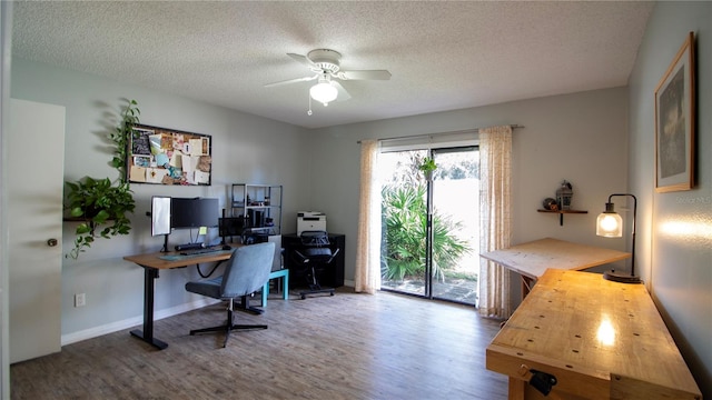 office space with hardwood / wood-style flooring, ceiling fan, and a textured ceiling